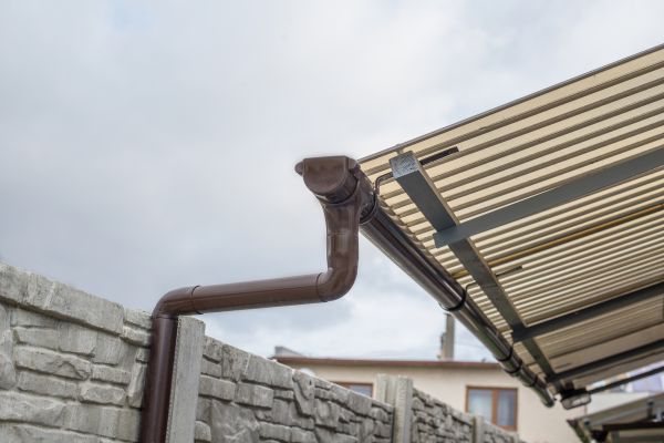 Plastic Downspout Installation in Carrollton